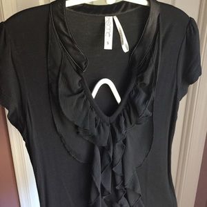 Black ruffled shirt